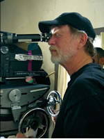 Michael Corbett calls a shot on the set of Captiva Island.