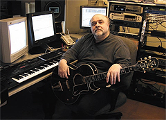 In his home studio, Joe Renzetti writes movie music using Motu's