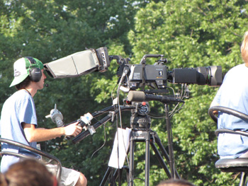 On location: Cinematographer working behind the camera. St. Louis Rock the River stop; Photo courtesy of Special Events Services.