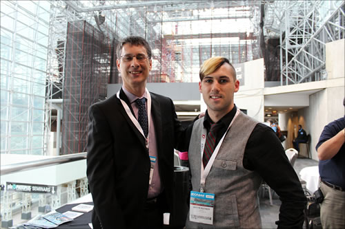 Kim Welch, Publisher/Editor-in-Chief of StudentFilmmakers.com + StudentFilmmakers Magazine (pictured left). Justin Kutner (pictured right) greets magazine crew inside the Press Room at PhotoPlus Expo 2012; photo by Jody Michelle Solis.