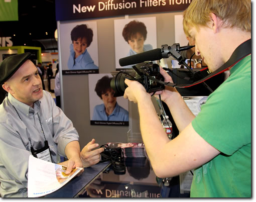 Carey Duffy (left) talks with StudentFilmmakers Magazine at the Tiffen Booth (# C8818) at NAB, Las Vegas, Nevada. Tim Hardy (right) behind the camera. 