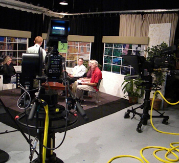 KSMQ "Cities on the Move" host Stephanie Passingham prepares guests for an upcoming discussion of online social networking. Shown in the foreground is one of the station's new Hitachi SK-HD1000 HD cameras.
